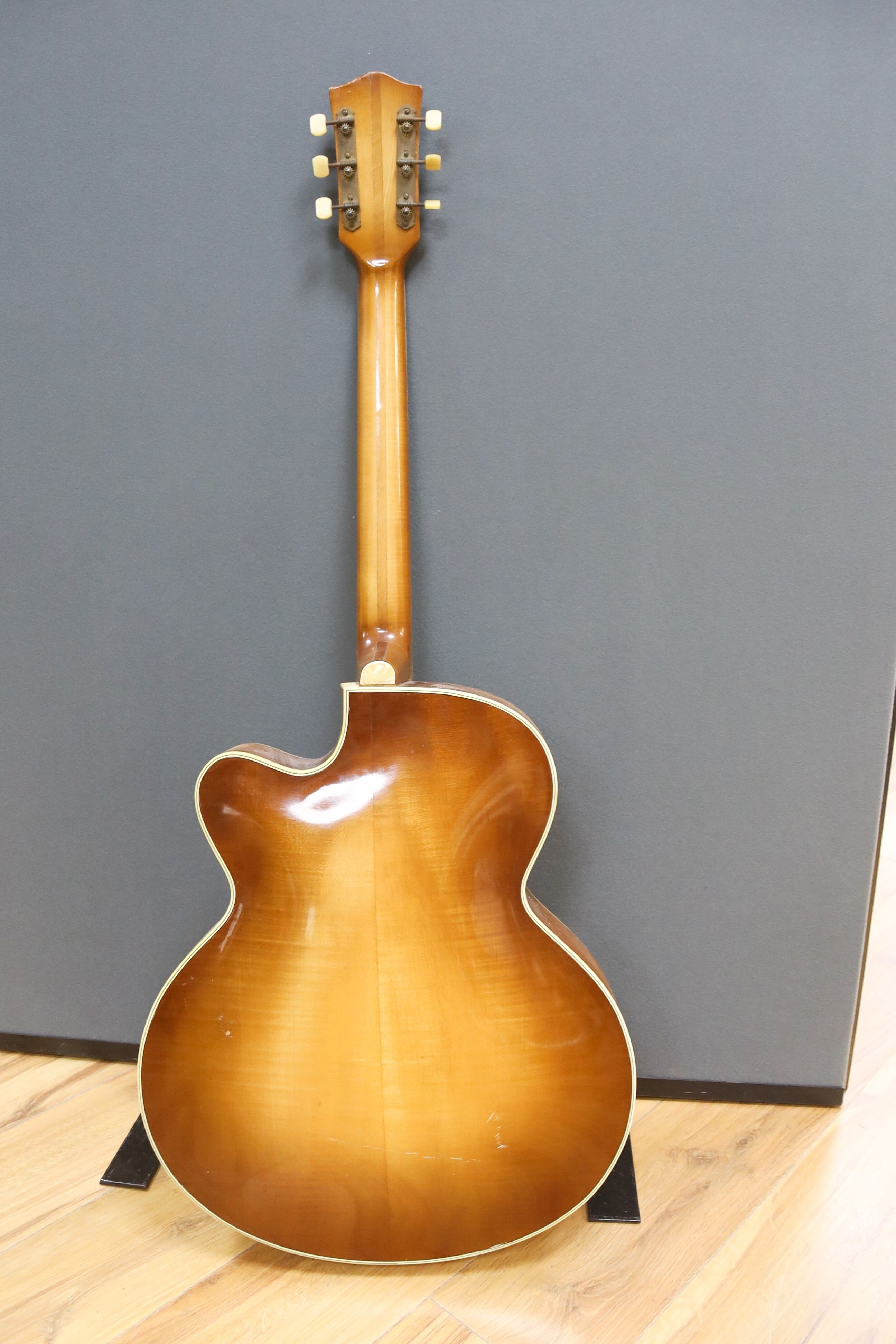 A Hofner acoustic f-hole guitar, circa 1950, having mother of pearl and tortoiseshell inlay to fret and head